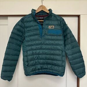 Women’s Patagonia pullover puffer snap puffer jacket in blue. size XS